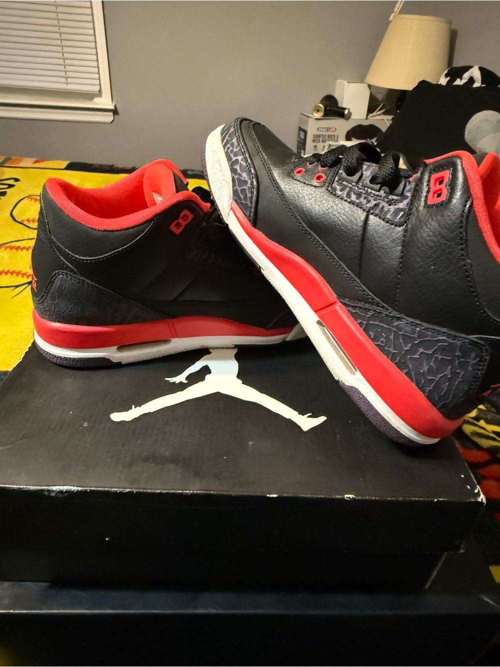 Jordan Retro Low Top Sneakers in Black and Red